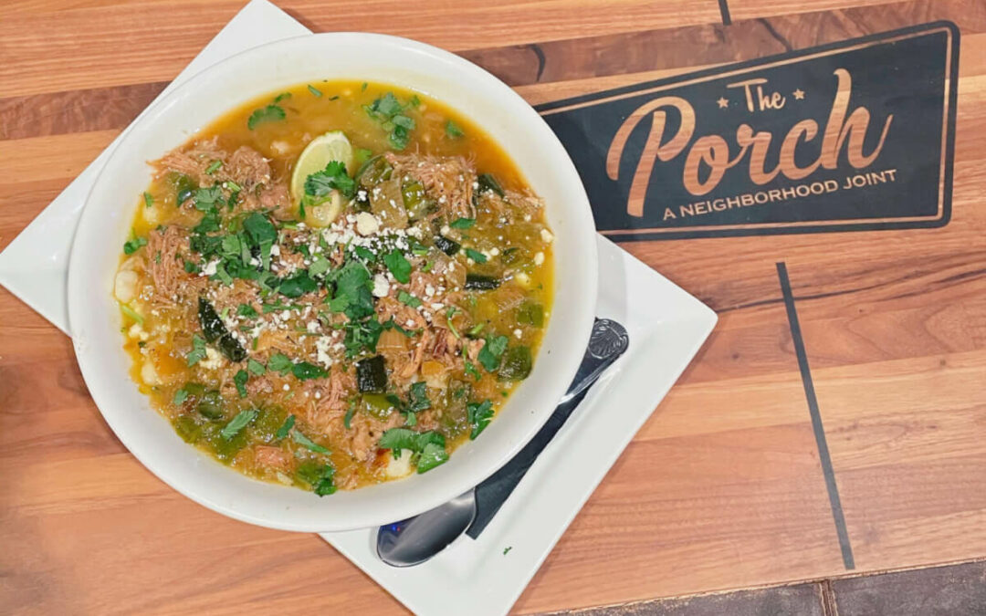 Bowl of soup on a table at The Porch, A Neighborhood Joint